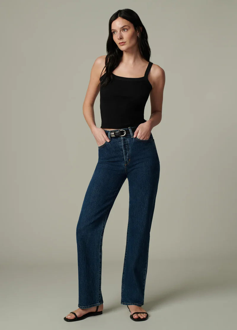 Blue jeans with a black top